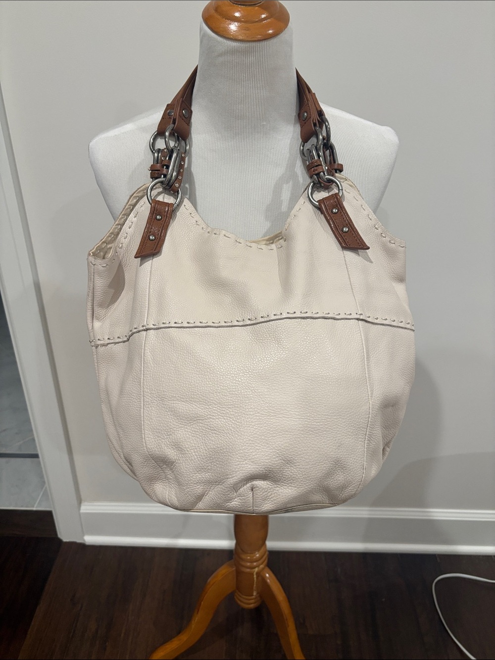 The Sak Cream Shoulder Hobo with Brown Leather Handles and Ring Hardware